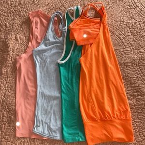 Lot of athletic tank tops.